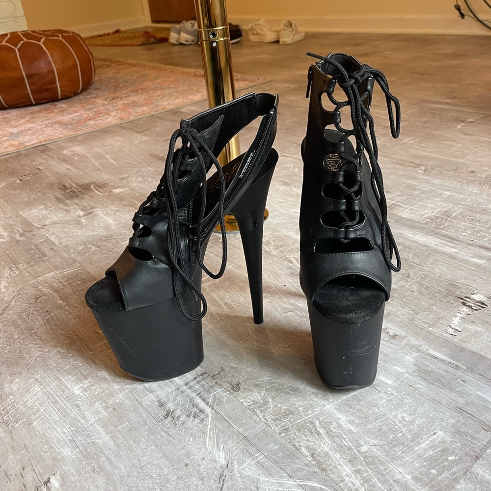 Pleasers size 9. Pole heels, Flamingo 8” heel 4” platform. Lightly used